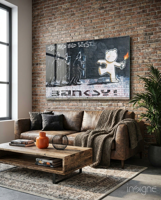 Bear's Resistance glass art canvas displayed above brown leather sofa in modern loft interior with exposed brick walls.