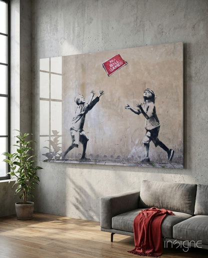 Modern living room interior with stenciled street art canvas on concrete wall depicting two children playing ball with "No Ball Games" sign above.
