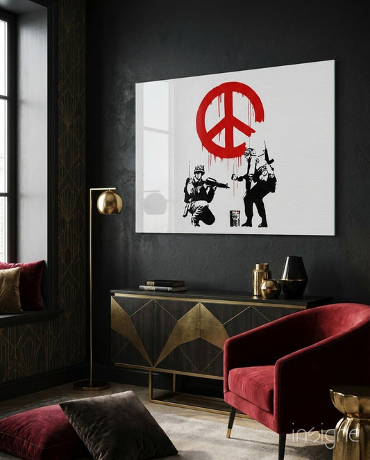 Modern living room interior featuring large glass art panel displaying red peace symbol with black silhouetted soldiers beneath it.