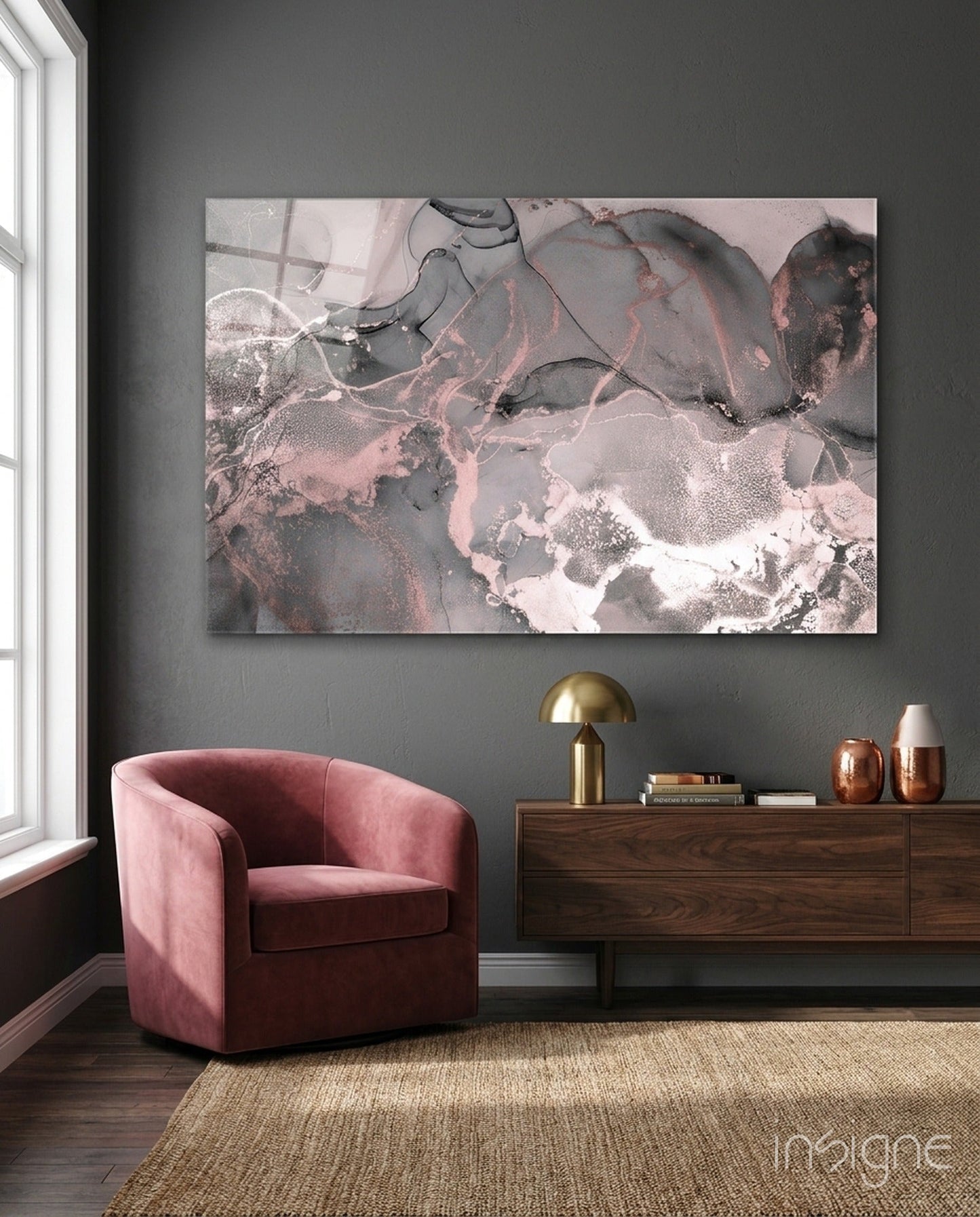 Sweet Pink Glass Art displayed above a wooden dresser in a modern grey room with pink velvet chair.
