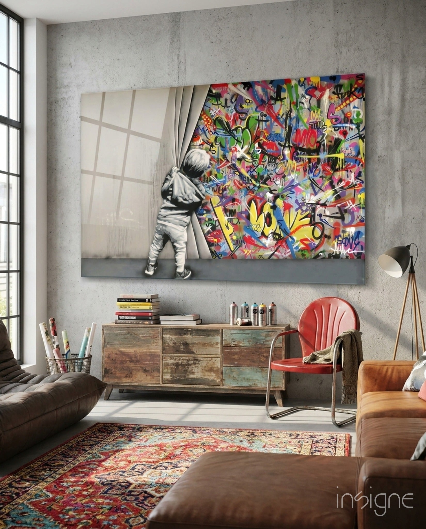 Behind the Curtain Glass Art displayed on concrete wall above wooden dresser in modern living room with colorful graffiti and child figure.