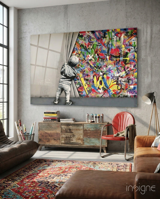 Behind the Curtain Glass Art displayed on concrete wall above wooden dresser in modern living room with colorful graffiti and child figure.