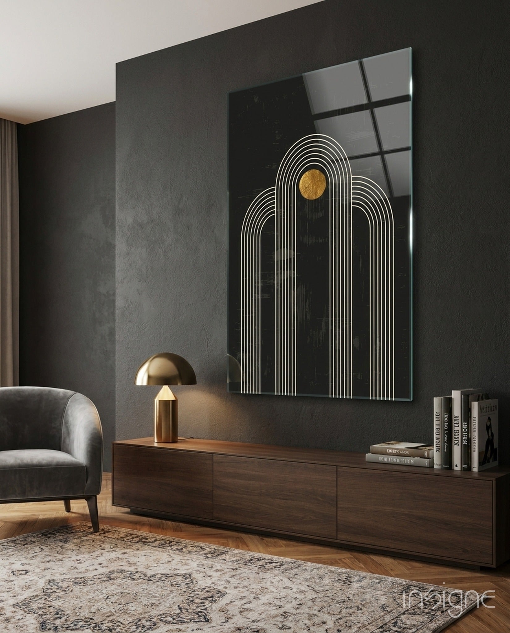 Modern living room interior featuring geometric glass wall art with white arched lines and golden circle on dark background above wooden console.