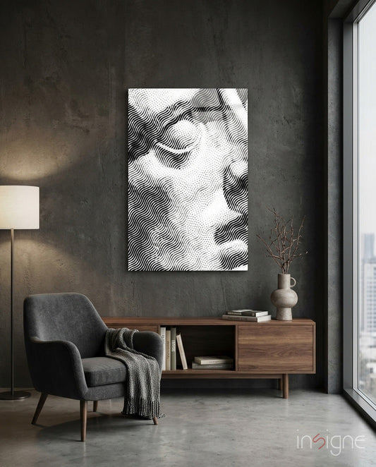 Black and white wavy line abstract canvas hanging above wooden credenza in minimalist concrete interior space.