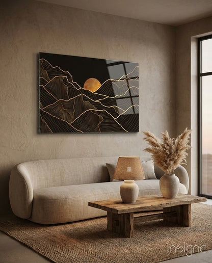 Moon and Mountains Glass Wall Art displayed above beige sofa in minimalist living room with wooden table and pampas grass decoration.