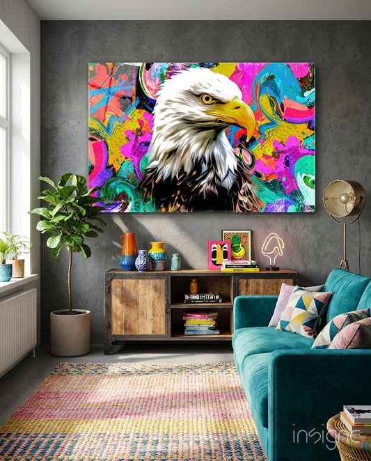 Vibrant pop art eagle head glass wall art with colorful abstract background displayed above wooden media console in modern living room.
