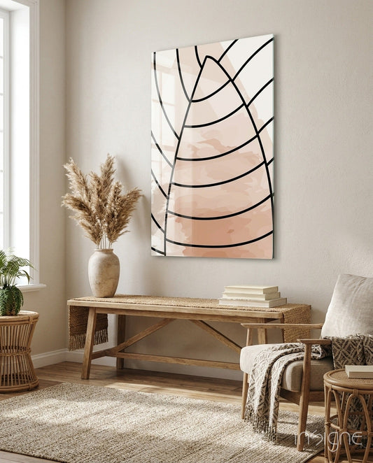 Blush beige minimalist leaf lines glass wall art displayed above wooden console table in modern living room with pampas grass decor.
