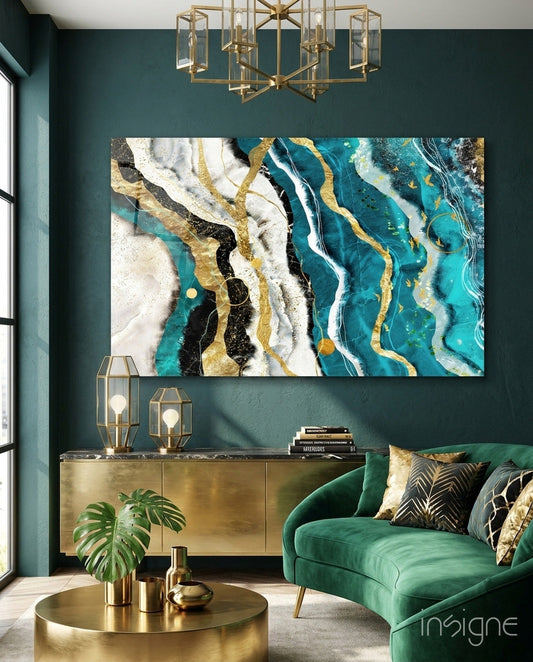 Marble Waves Glass Wall Art displaying turquoise, white, black, and gold abstract patterns hung in modern living room interior.