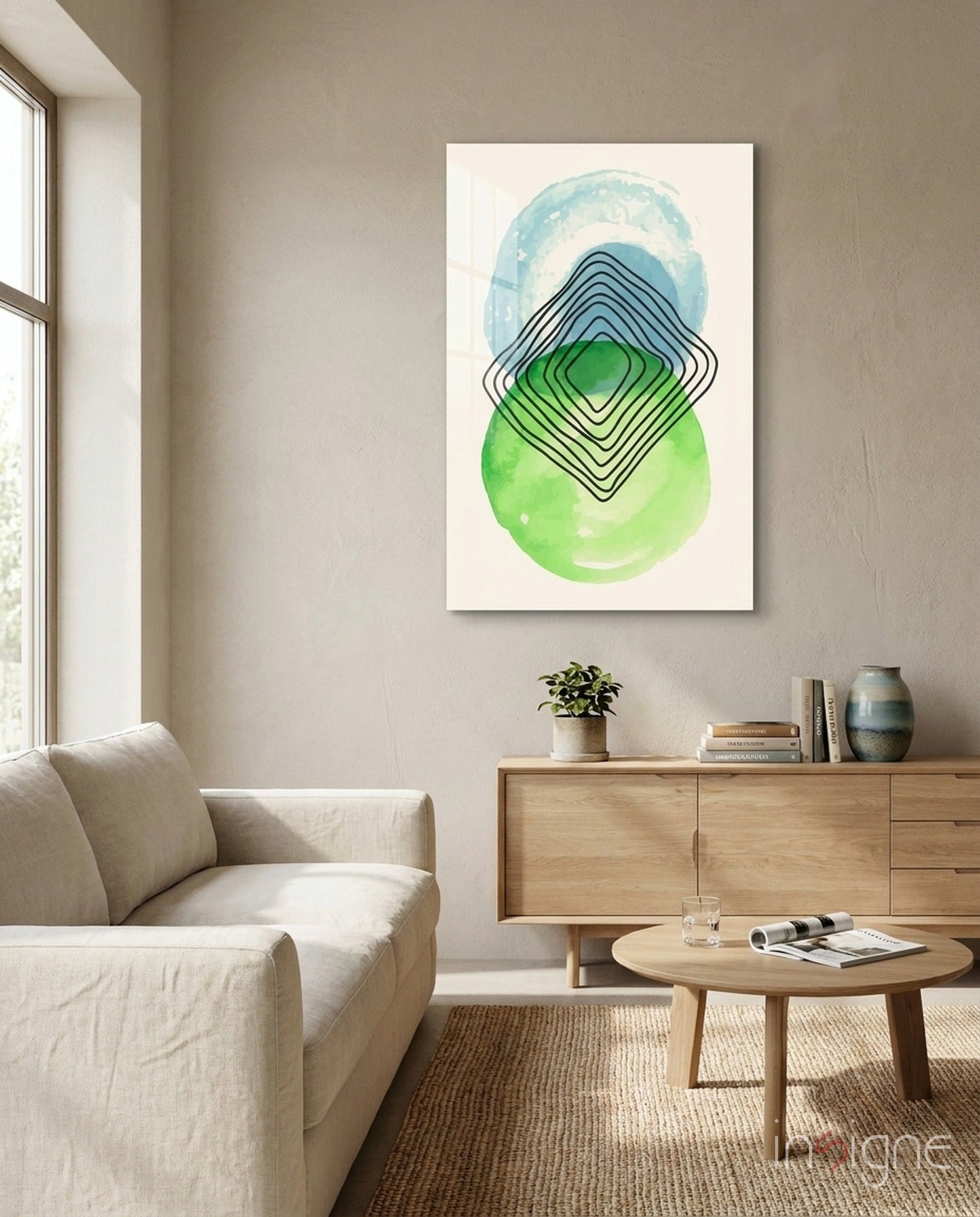 Abstract Circles Glass Wall Art with blue, green, and black concentric shapes displayed above wooden furniture in a minimalist living room.