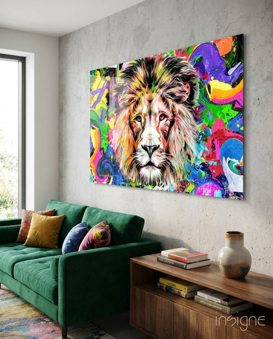 Vibrant multicolored lion head glass wall art displayed above a green sofa in a modern living room setting.