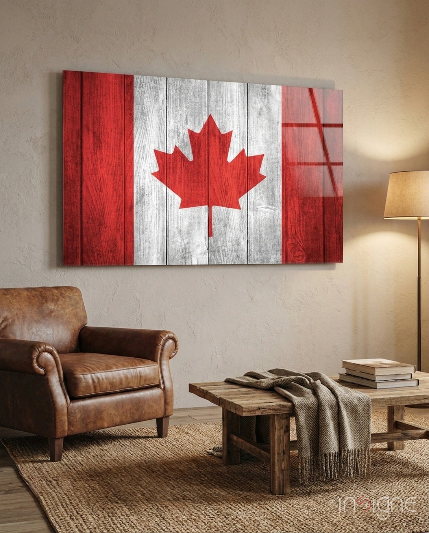 Canadian flag glass wall art displayed above a leather armchair in a living room with wooden furniture and warm lighting.
