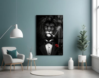 Black and white glass wall art depicting a lion wearing a tuxedo and bow tie with a red rose, displayed in a turquoise room with white furnishings.