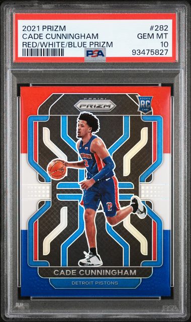 PSA-graded 2021 Panini Prizm Cade Cunningham rookie card in red, white, and blue prismatic design, displayed in protective case.