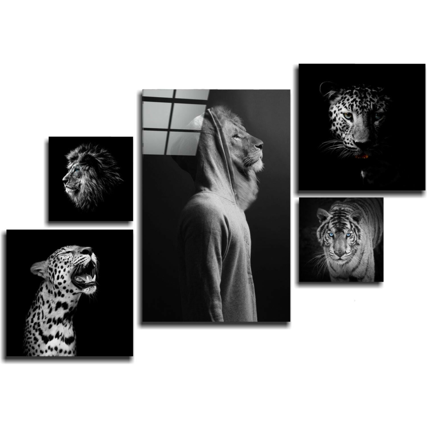 Five black and white framed glass wall art prints arranged in staggered layout featuring lion, leopard, and tiger wildlife portraits.
