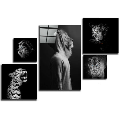 Five black and white framed glass wall art prints arranged in staggered layout featuring lion, leopard, and tiger wildlife portraits.