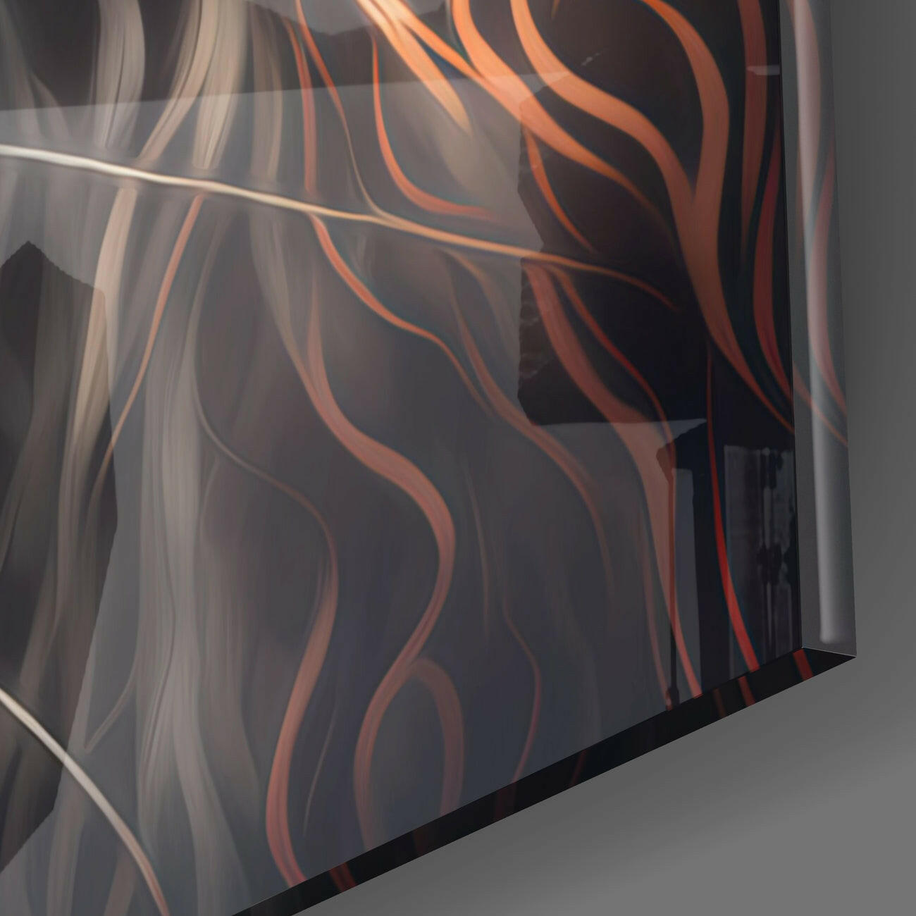 Close-up angled view of glass wall art featuring flowing orange and cream streaks against dark background.