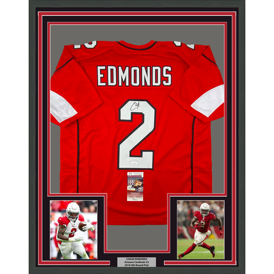 Framed red Arizona Cardinals jersey number 2 signed by Chase Edmonds with flanking action photos and authentication certificate.