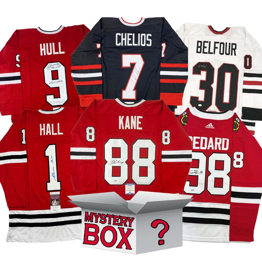 Six autographed Chicago Blackhawks jerseys in red, black, and white arranged around a gray mystery box with question mark.