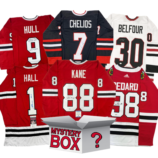 Six autographed Chicago Blackhawks jerseys in red, black, and white arranged around a gray mystery box with question mark.