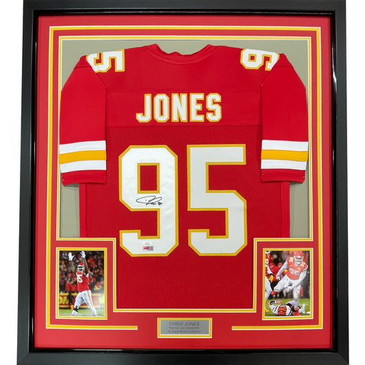 Framed red Kansas City Chiefs #95 Jones jersey with white and gold trim, displayed front-facing with two player photos below and nameplate.