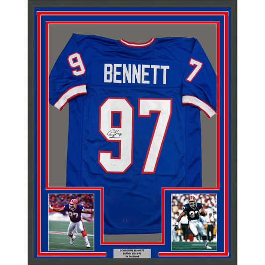 Framed blue Buffalo Bills jersey number 97 signed by Cornelius Bennett, displayed flat with two action photos below and red and blue matting borders.