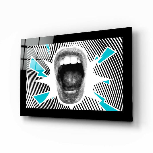 Glass wall art mounted at an angle displaying a grayscale open mouth with cyan lightning bolts and diagonal stripe pattern.