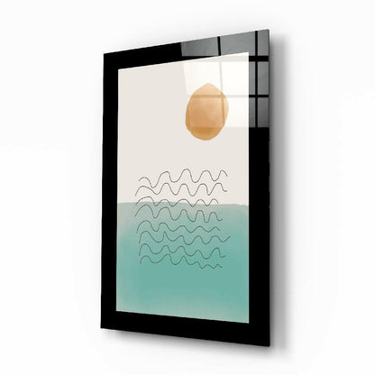 Black-framed glass wall art featuring a tan sun, wavy line patterns, and turquoise water gradient on cream background, displayed at an angle.
