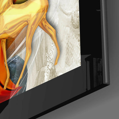 Close-up angled view of red and gold glass deer art mounted on white textured wall, showing anatomical detail and metallic finish.