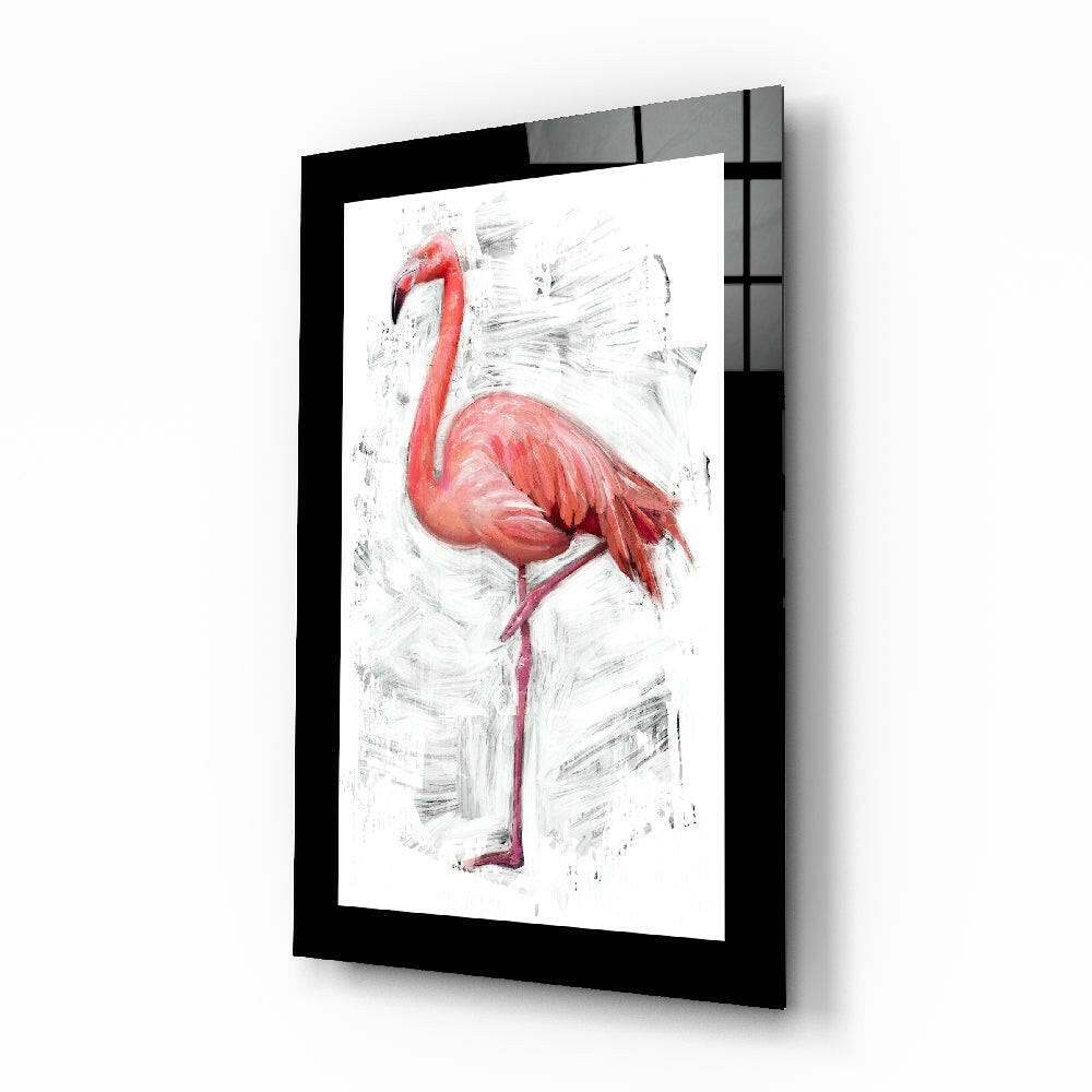 Black-framed glass wall art displaying a red flamingo illustration against a white textured background, angled perspective view.