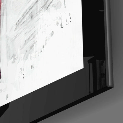 Close-up angled view of frosted glass wall art with footprint impressions displayed on white wall surface.