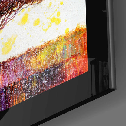 Angled side view of glass wall art displaying a colorful gradient from yellow and orange to red and purple with textured brushstroke effects.
