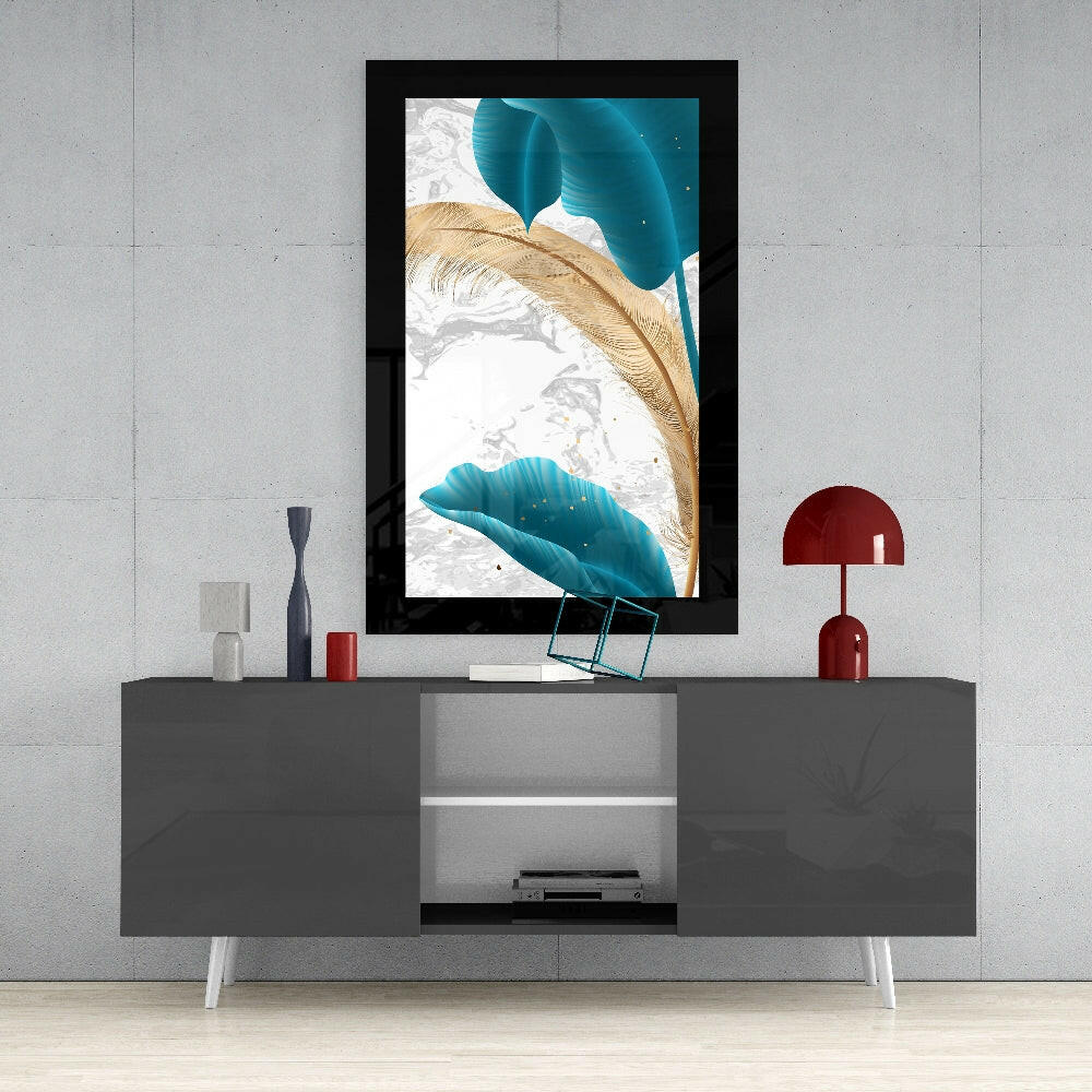 Framed turquoise and gold leaf glass art displayed above a gray media console in a modern living room setting.