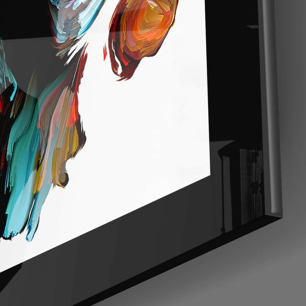 Abstract Thoughts Glass Wall Art displayed at an angle showing vibrant turquoise, red, and orange brushstroke patterns on white background.