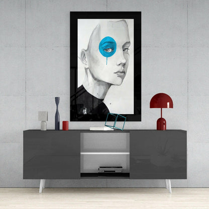 Blue VisionGlass framed wall art displayed above gray console table with red lamp and decorative accessories.