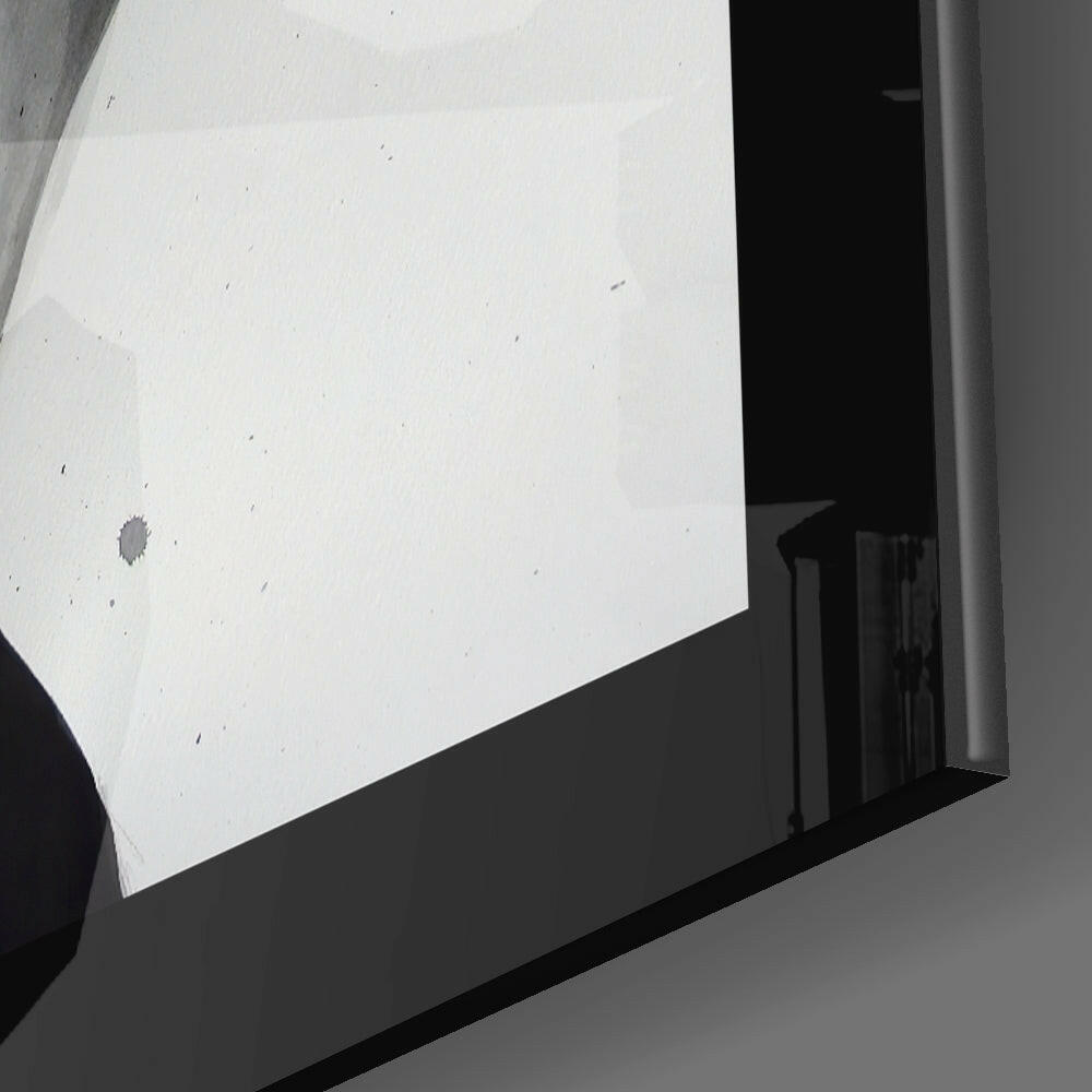 Close-up angled view of white glass panel mounted on black frame showing subtle dust particles and surface texture.