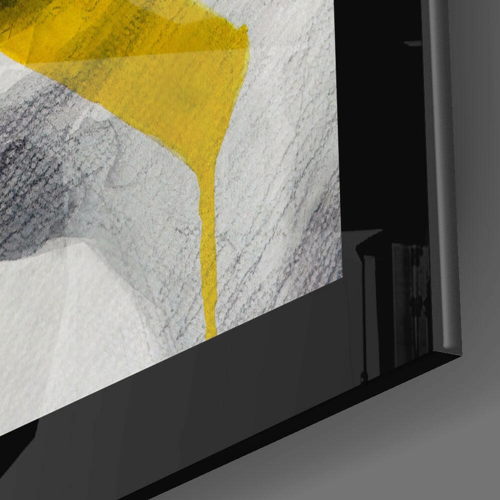 Close-up angled view of No Talking Glass Wall Art displaying yellow geometric shape on textured gray and white background.