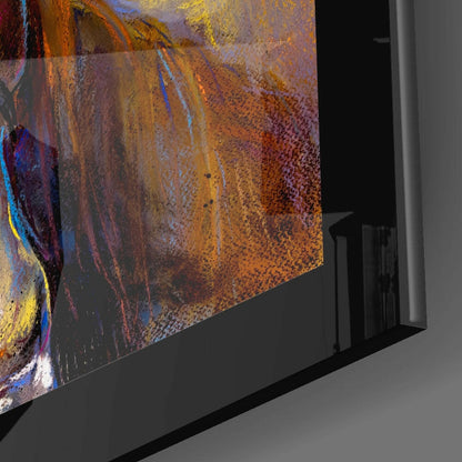 Close-up angled view of farm horses glass wall art showing warm orange and brown tones with blue and yellow accents, mounted in black frame.