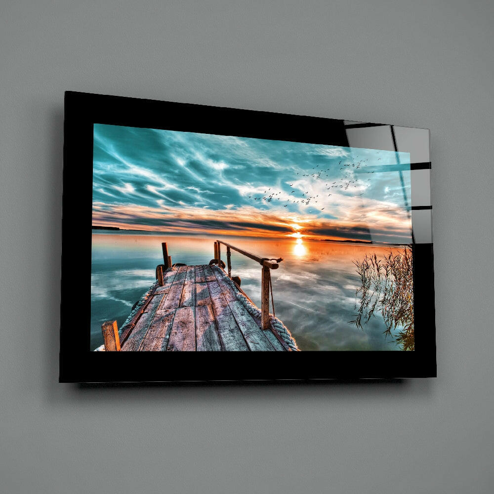 Weathered Dock With Bird Flock at Sunset Glass Wall Art