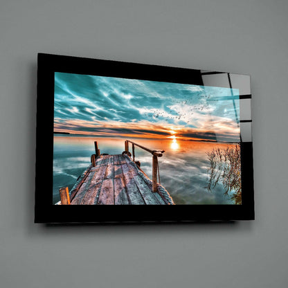 Weathered Dock With Bird Flock at Sunset Glass Wall Art