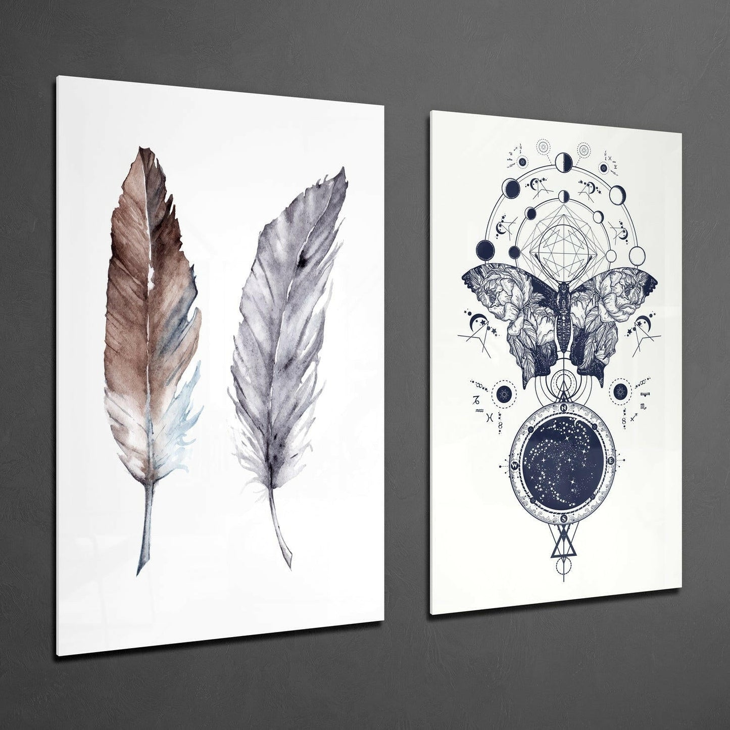 Two framed glass wall art pieces displayed at an angle: left panel shows two watercolor feathers in brown and gray tones; right panel features an intricate black ink illustration of a moth with celestial and geometric symbols.
