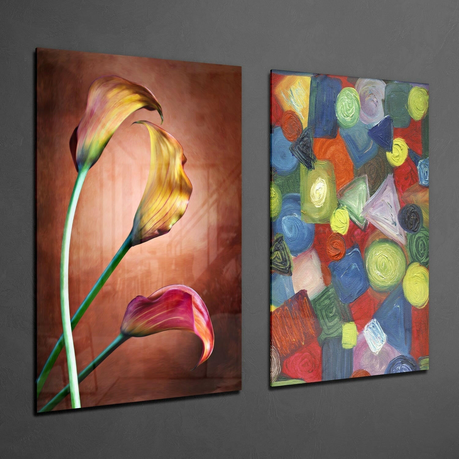 Two glass wall art panels displayed on gray wall: left panel shows glowing tulips with warm orange-red tones; right panel features colorful geometric shapes in blue, yellow, green, and red.