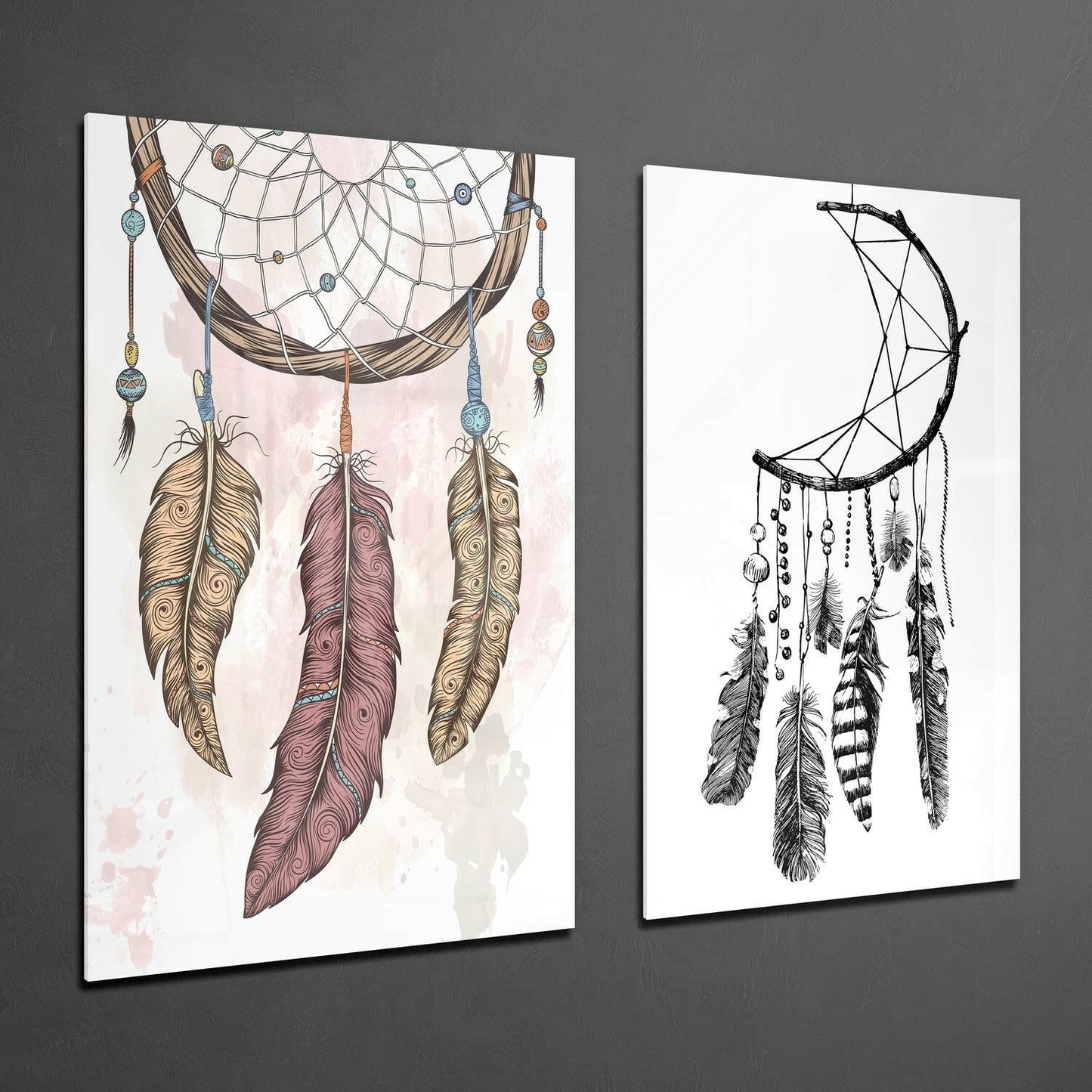 Two glass wall art panels displayed at an angle on gray wall: left panel shows colorful dreamcatcher with ornate feathers; right panel shows monochrome crescent moon dreamcatcher.