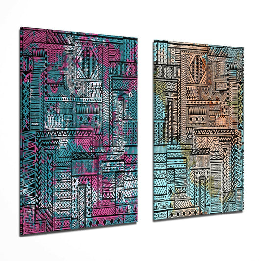 Two glass wall art panels displayed at an angle showing pink-turquoise and brown-cream ethnic geometric patterns with intricate line work.