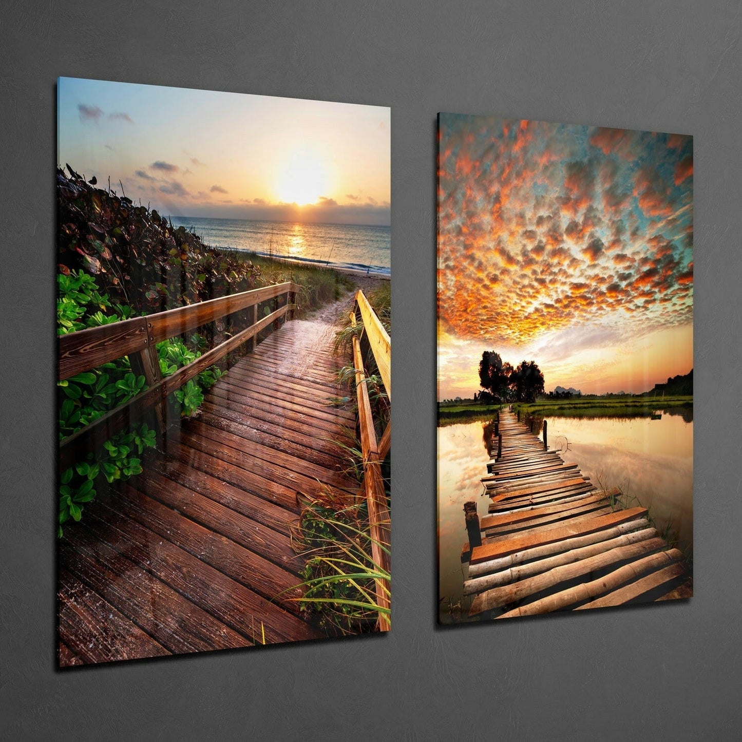 Two glass wall panels displaying wooden boardwalks extending toward sunsets over water, with vibrant orange and golden skies.