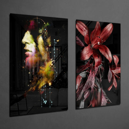 Two glass wall art panels displayed on gray wall: left panel shows colorful profile of man's head with cosmic effects, right panel displays deep red flowers with dark leaves.