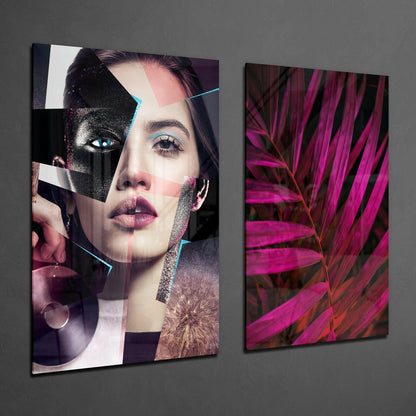 Two glass wall panels displaying abstract portrait collage with cyan accents and vibrant magenta botanical imagery against gray wall.