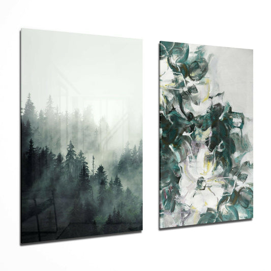 Two glass wall art panels displayed side by side: left shows misty forest with evergreen trees, right features abstract teal and white painted brushstrokes.