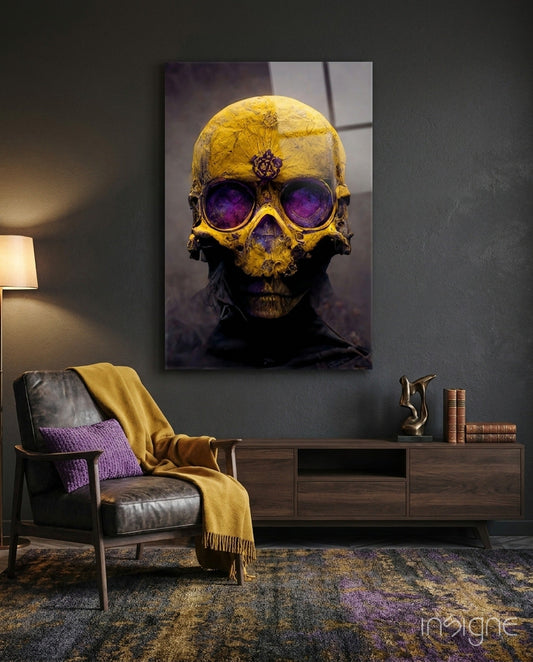 Yellow skull with glowing purple eyes displayed on dark wall above leather chair with yellow throw blanket.