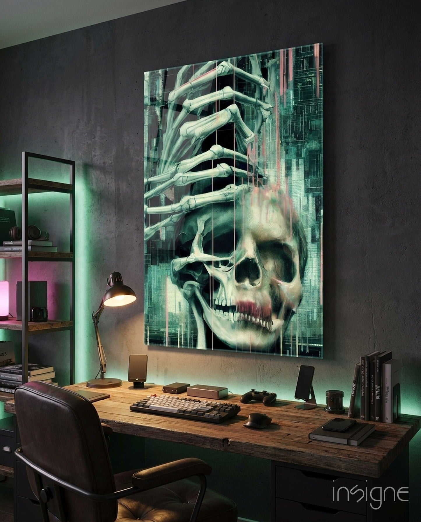 Glass art panel mounted above wooden desk displaying skeletal hands emerging from skull with green and pink architectural background in modern office setting.