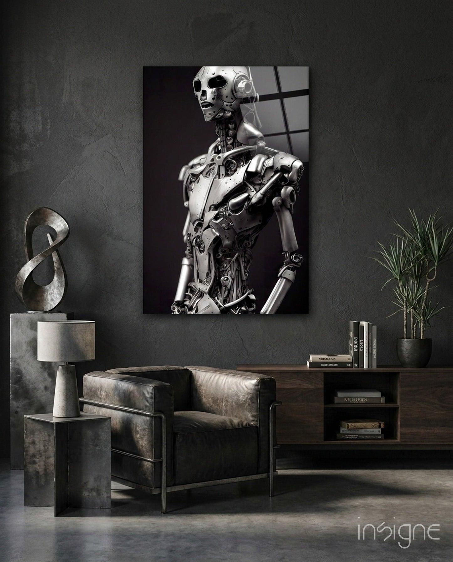Black and white canvas of mechanical humanoid robot displayed in modern loft interior with leather chair and wooden shelving.